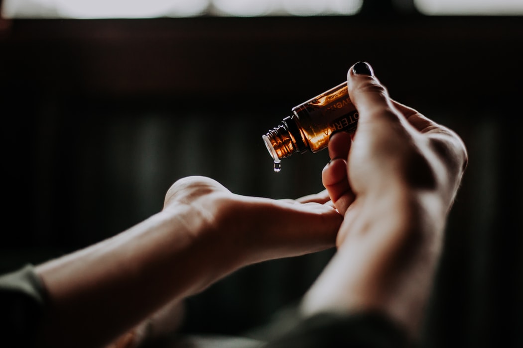Hemp extract is applied to someone’s skin topically 